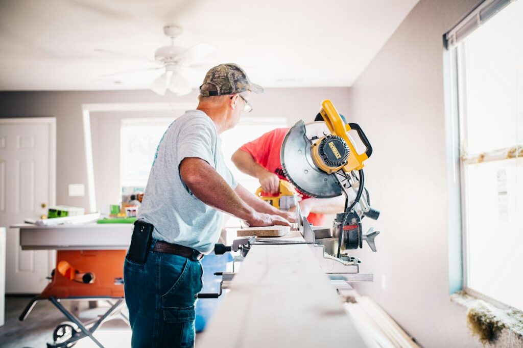 Carpenter at a mitre saw